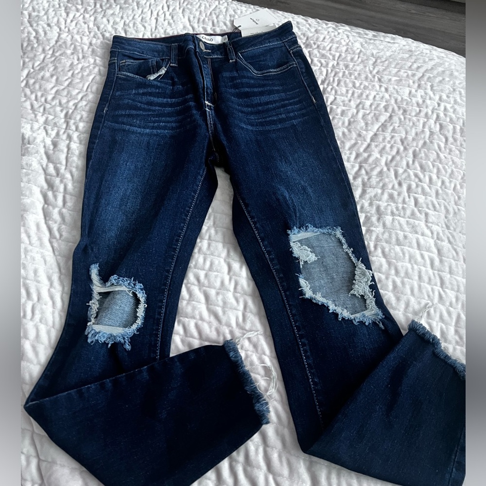 Ripped Knee Jeans